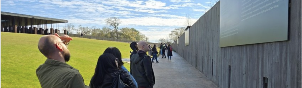 AFCS Team reflecting at the National Memorial for Peace and Justice